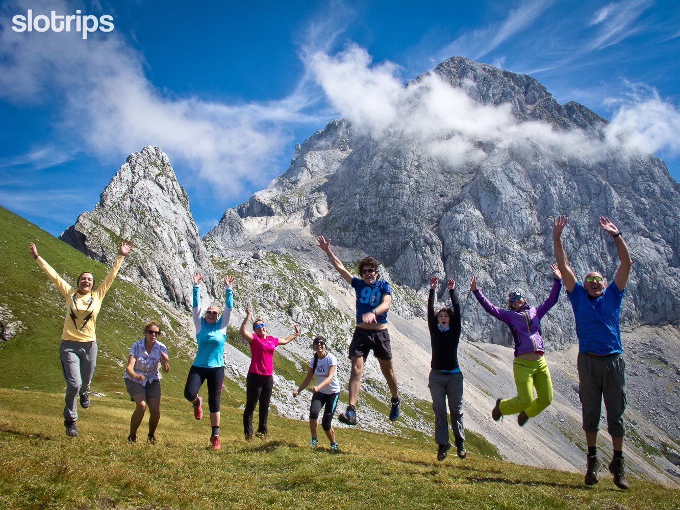 Happy hikers on a walking trip in the Julian Alps, Slovenia