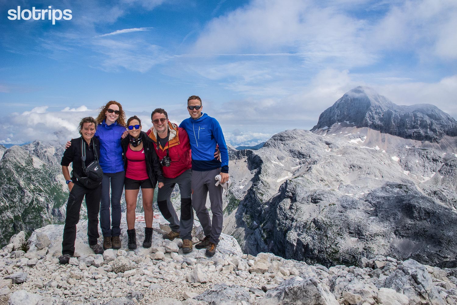 Hikers on Mt. Kanjavec on a group hiking tour in the Julian Alps