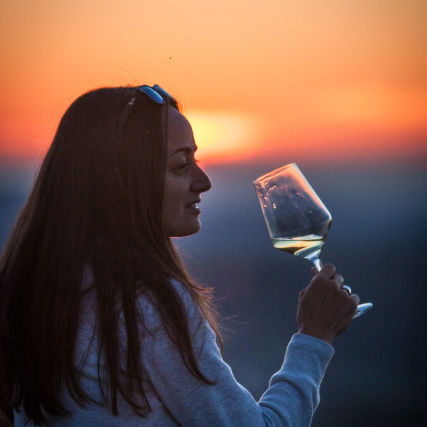 Enjoying a glass of amazing local wine at the sunset