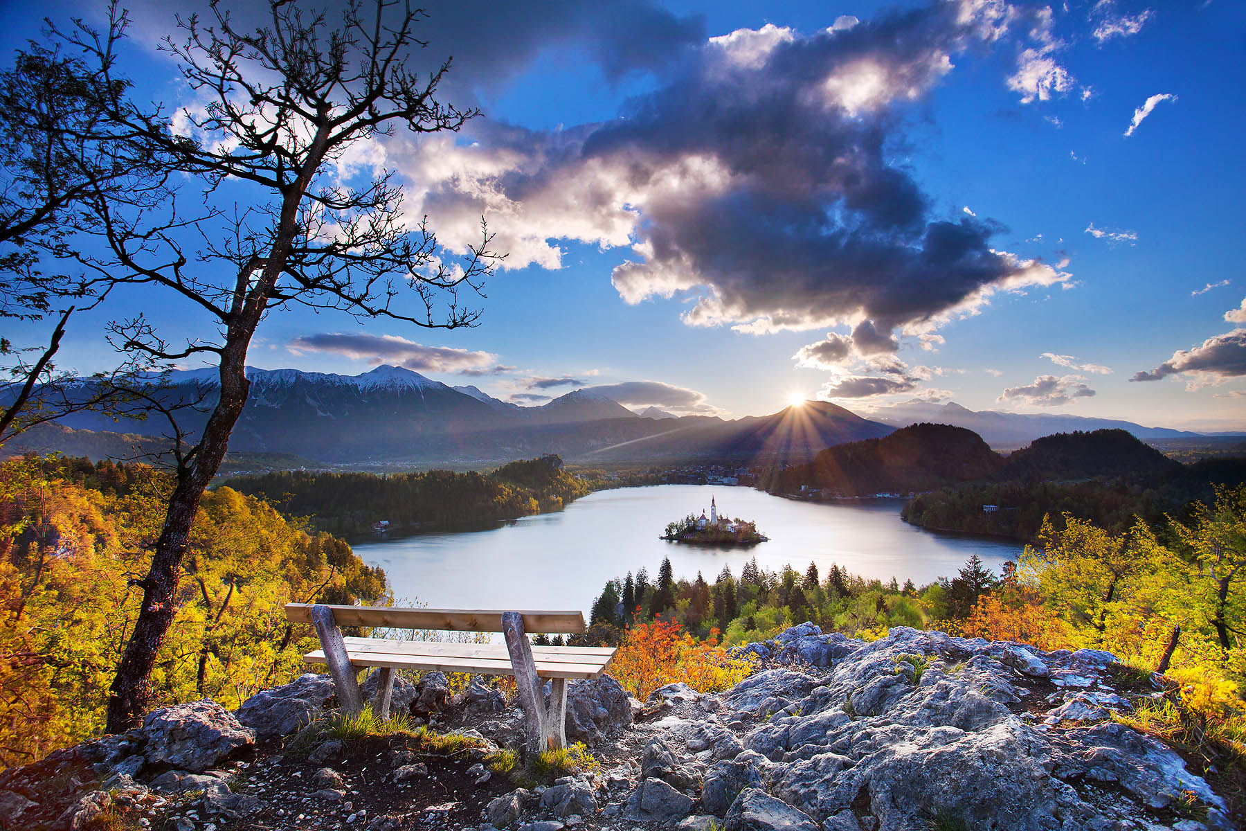 Lake Bled at sunrise from the Ojstrica viewpoint above the Zaka bay with Mt. Stol and Kamnik-Savinja Alps covered with snow in the background