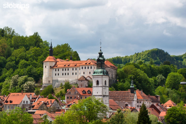 The old town center with the town castle and main town church of Skofja Loka in Slovenia