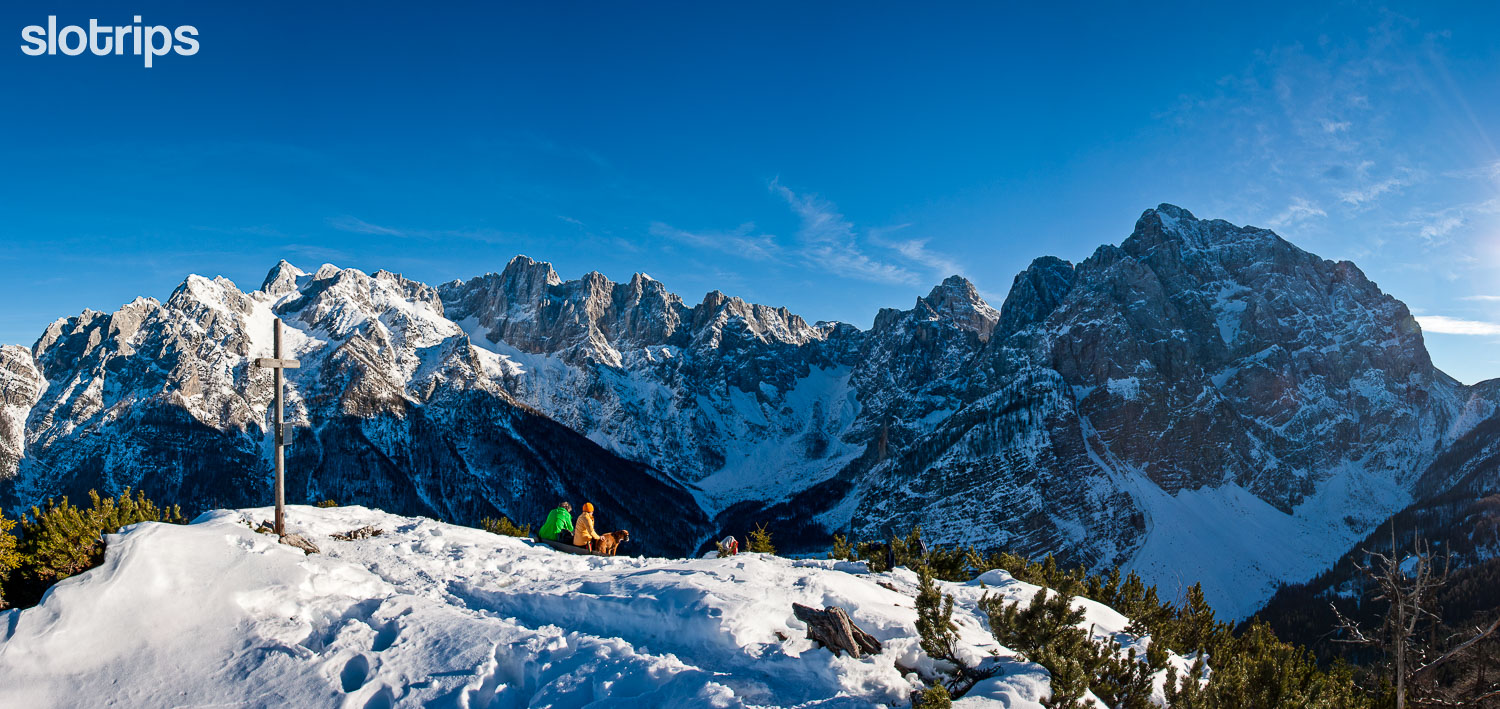 A winter panorama towards Mt. Spik, Skrlatica and Prisojnik as seen from Mt. Visoki Mavrinc above the Vrsic Pass in Julian Alps in Slovenia