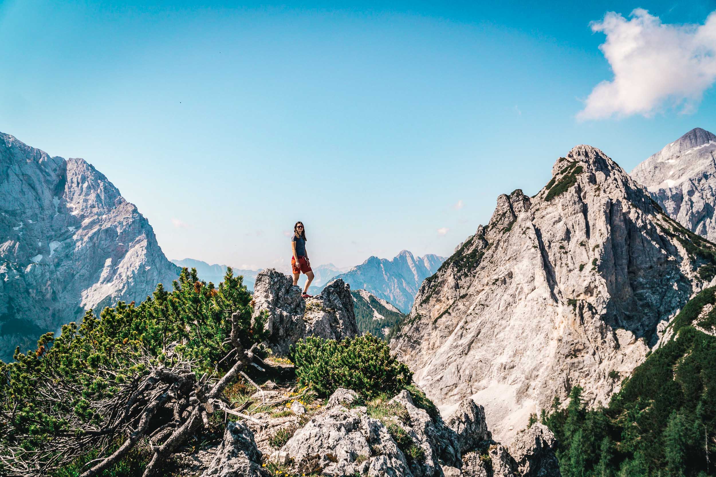 Hiker on a ridge during one of the best hikes in Slovenia near Vrsic pass
