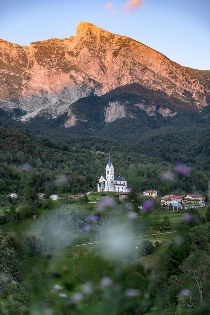 The church in Dreznica below Mt. Krn during a hike on Juliana Trail, Slovenia