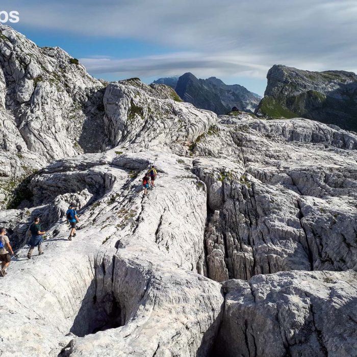 Walking across the karstic terrain of the Triglav National Park, Slovenia