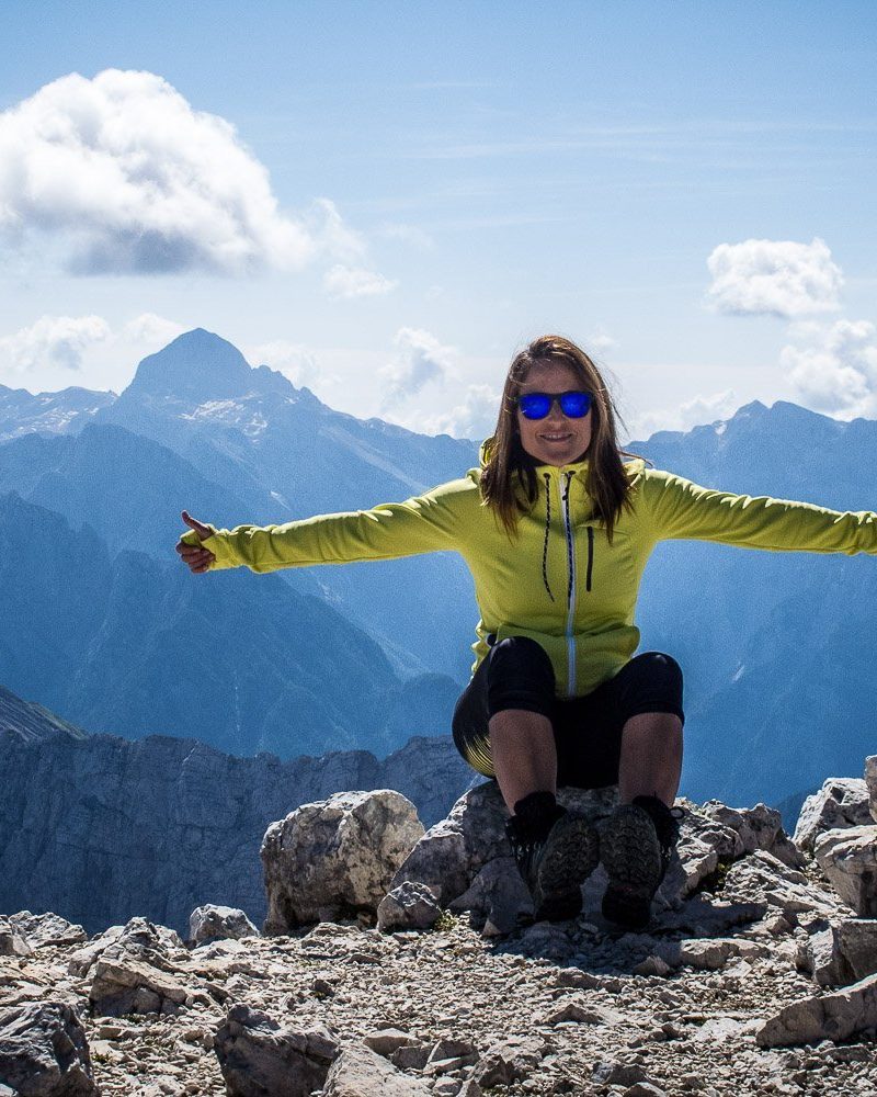 Happy hiker on a hiking trip in Slovenia and the Julian Alps