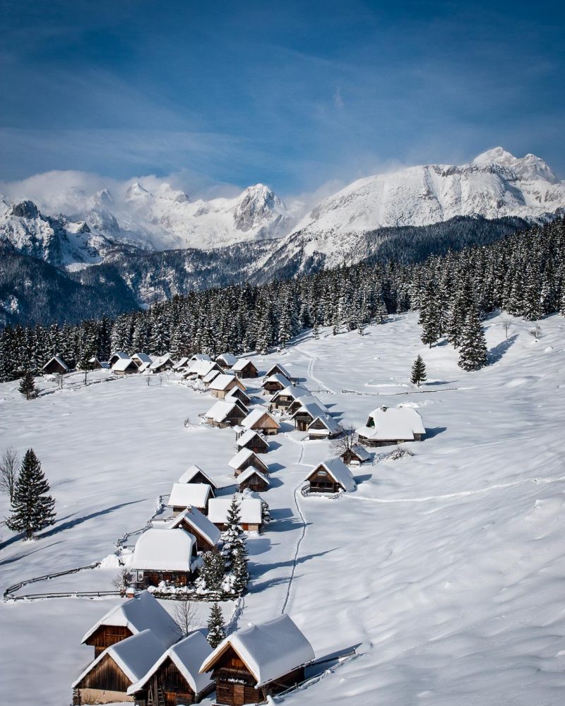 Winter panorama of the Julian Alps from Zajamniki alpine pasture, Slovenia
